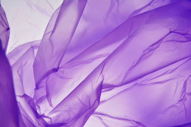 Plastic bag background. Purple color, graphic patches effect background designs element.