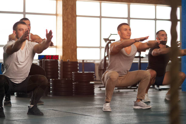 istock Multi-ethnic Group of Male Athletes Training in Gym 1139512766