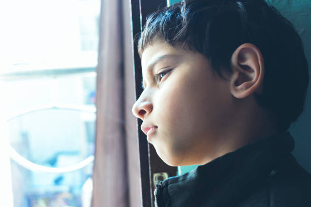 istock Thoughtful and cute sad little boy 1139513351