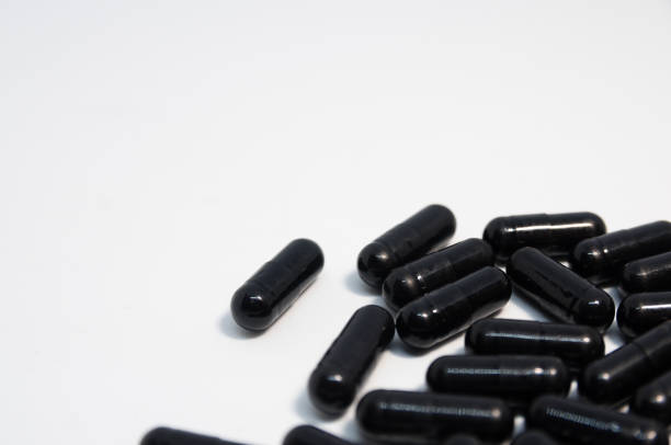 istock Medical black pills 1139515230