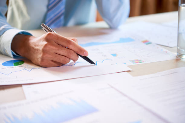 istock Businessman exploring trends and tendencies 1139516019