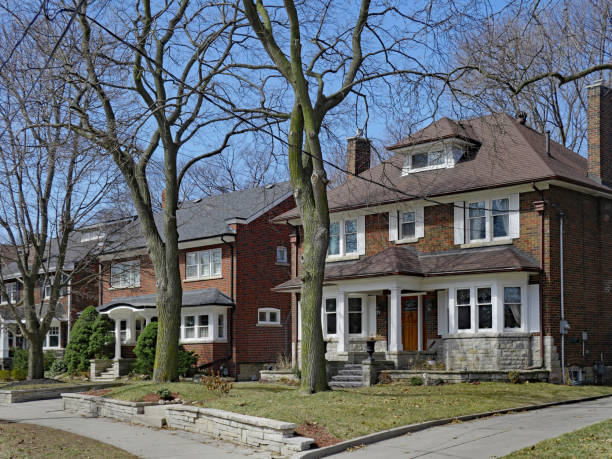 istock Row of large old  detached brick houses 1139518283