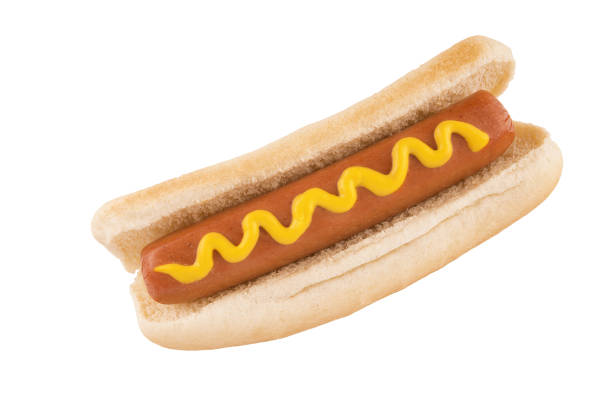 istock Close up on hot dog with mustard on top, isolated. 1139529127