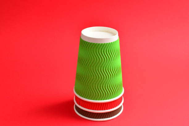 istock Red, green, brown paper cups on a red background. Copy space. 1139530333