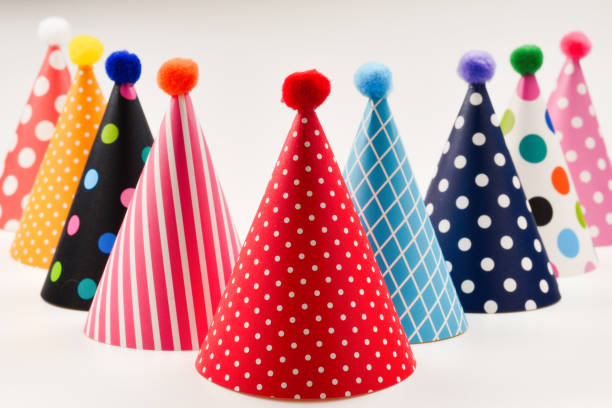 istock Colorful birthday caps on a white background. 1139530538