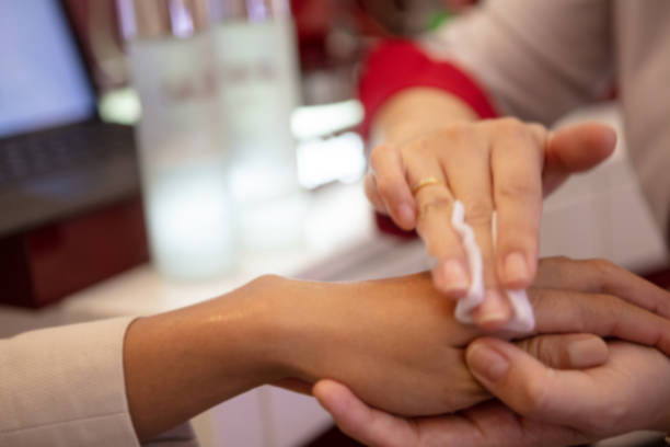 istock Beautician applying hand cream 1139534270