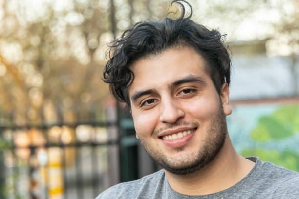 istock Smiling young man looking at the camera 1139538016