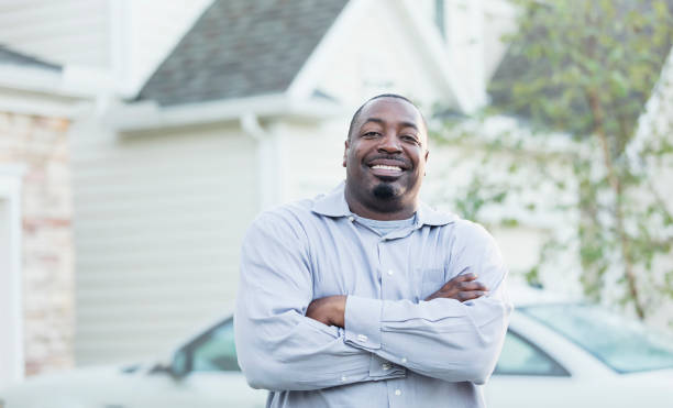 istock Mature African-American man standing outside home 1139540335