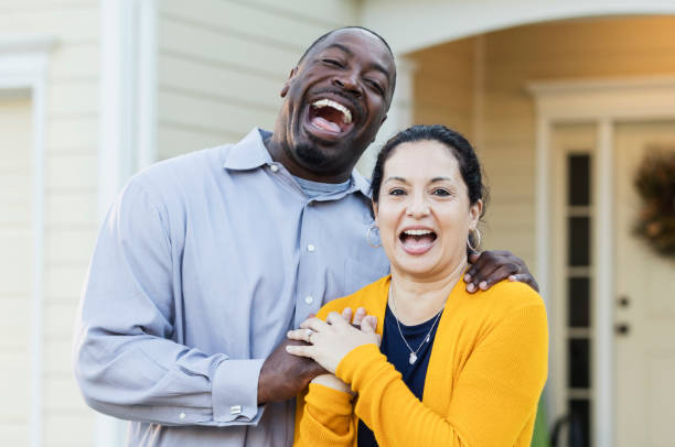 istock Happy interracial couple outside house 1139540525