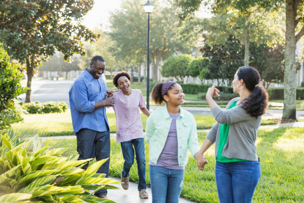 istock Interracial family, two children, taking walk together 1139541414