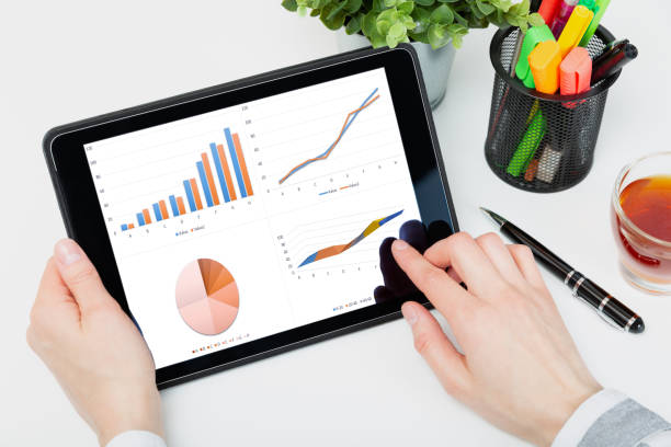 istock Data analysis concept shown on a tablet held by a woman 1139541490