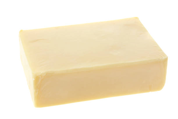 istock Block of Cheddar Cheese on White 1139542938
