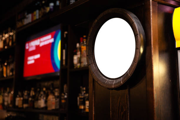 istock Blank ad Mock up frame on the blurred background of the bar - Empty space for advertisement 1139543162