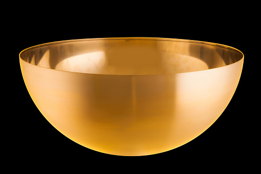 Empty metalic golden bowl, steel