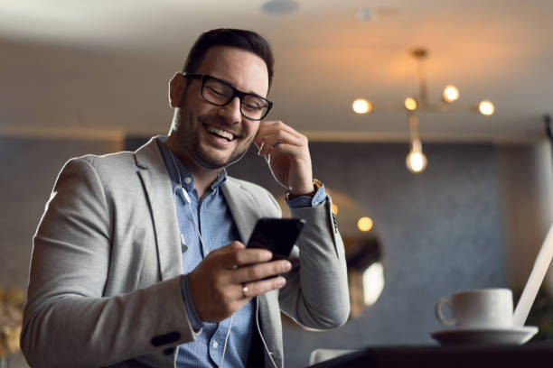 istock Businessman using mobile phone in cafe 1139550831