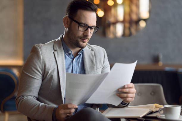 istock Young  businessman working on business reports in the office 1139551043