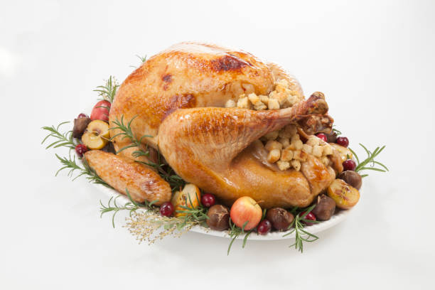 istock Roasted Turkey with Grab Apples over white 1139553750