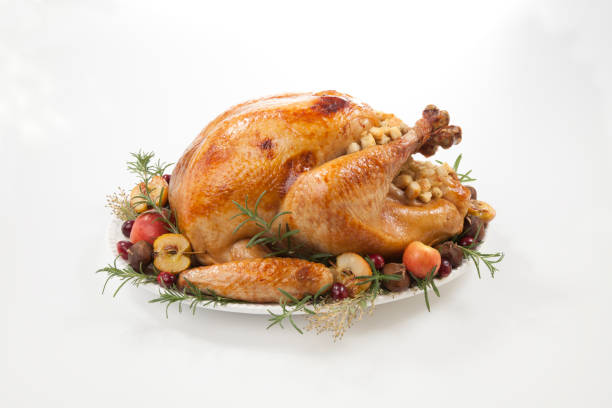 istock Roasted Turkey with Grab Apples over white 1139553758