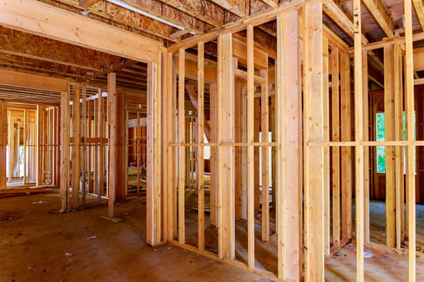 istock Close-up of beam built home under construction with wooden truss, post and beam framework. Timber frame house, real estate background 1139554097