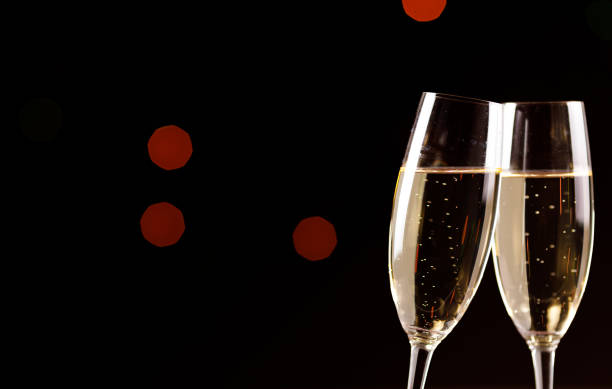 istock Champagne glasses on black background. Holiday celebration concept. 1139556221