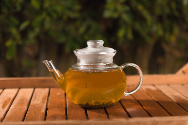 istock Tasty herbal tea in glass teapot on the table, summer leisure 1139562191