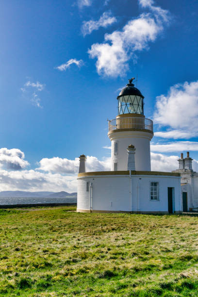 Chanonry Point, Black Isle, Scotland - March 14 2019:  This lighthouse overlooks the place where the Moray Firth joins the Beauly Firth.  This lighthouse is the beacon to guide ships negotiating these dangerous waters.