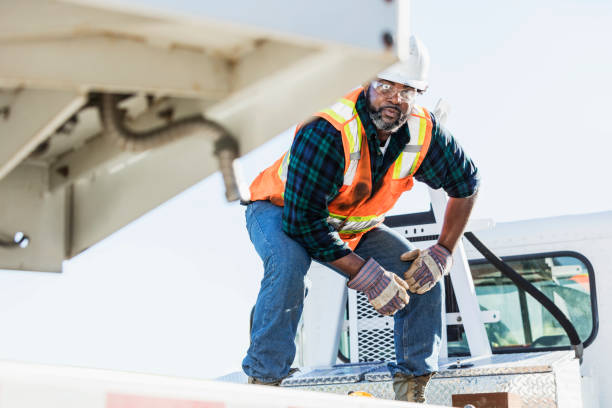 istock African-American construction worker on a crane 1139562363