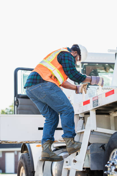 istock African-American construction worker on a crane 1139563044