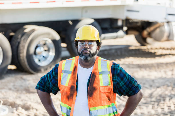 istock African-American construction worker by crane 1139563120
