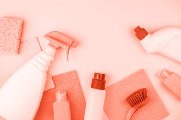 istock House cleaning products are on coral background. 1139567965