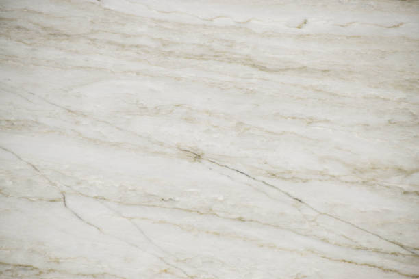 Closeup white quartzite stone with natural pattern texture background. stock photo