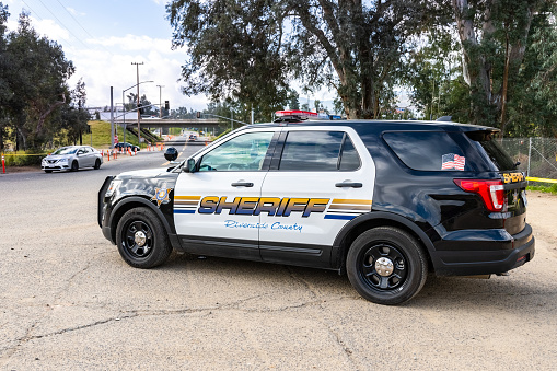 March 20, 2019 Lake Elsinore / CA / USA - Riverside County police car parked at the Walker Canyon trailhead