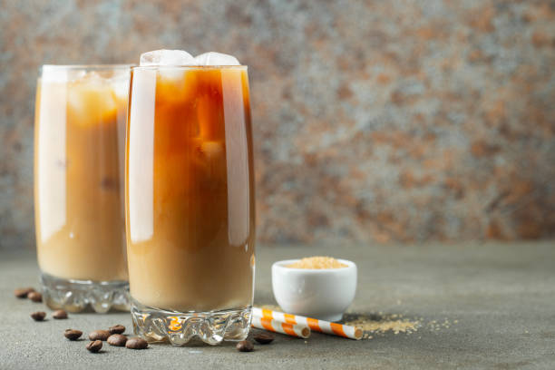 istock Ice coffee in a tall glass with cream. 1139583480