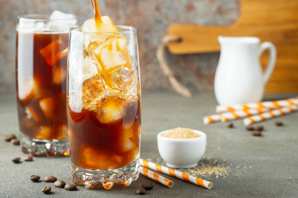 istock Ice coffee in a tall glass with cream. 1139583485