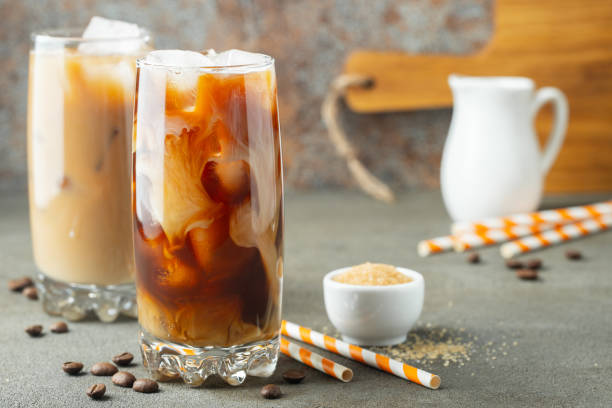 istock Ice coffee in a tall glass with cream. 1139583492
