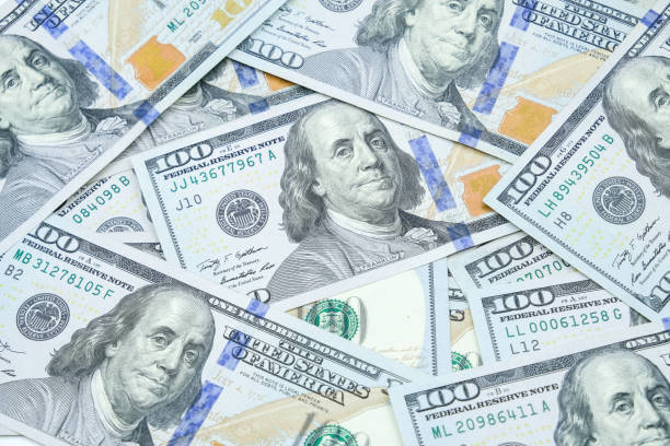 istock Pile of One hundred dollars banknotes pattern. 1139583556