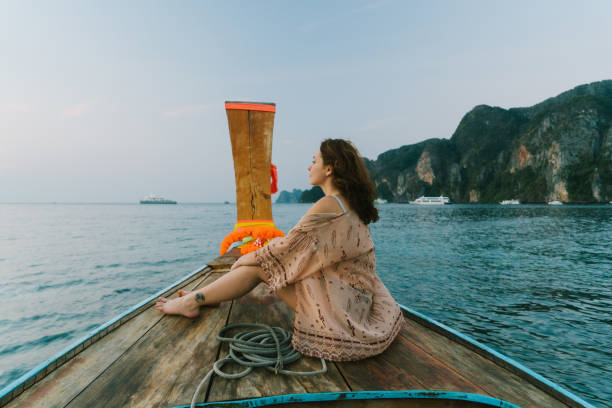 istock Woman on long-tail boat near Koh Phi Phi Island 1139587120