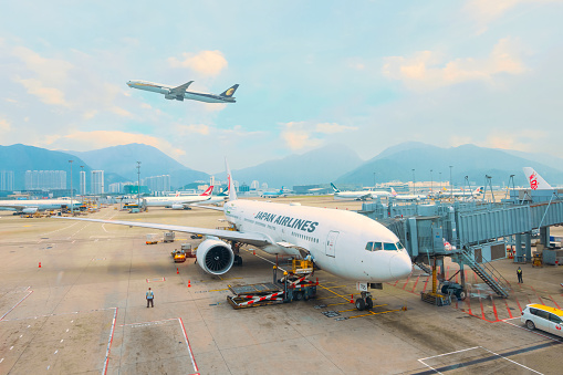 Hong Kong - April 19 2018:  Jet flights dock in Hong Kong International Airport where it's the world's busiest cargo gateway and one of the world's busiest passenger airports