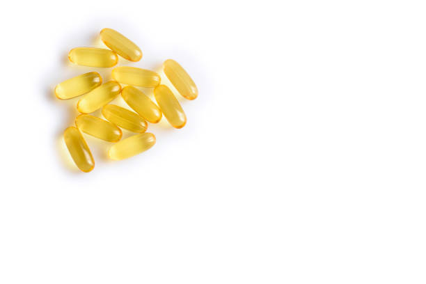 istock Fish oil pills on a white background - vitamins and dietary supplements 1139593973