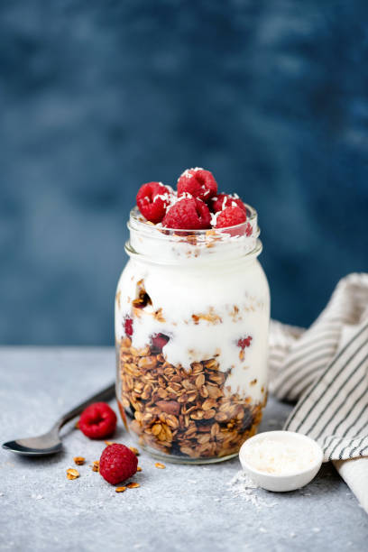 istock Granola with greek yogurt and berries in jar 1139597615