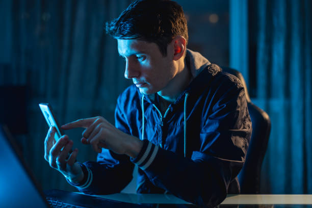 istock A young man working on a laptop at night. Designer or system administrator stayed late at work. 1139599073