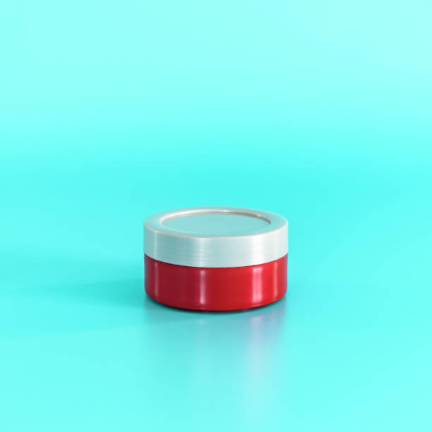 Red cosmetic jar on blue background Red cosmetic jar on blue background. Minimal concept. Copy space for text hair gel photos stock pictures, royalty-free photos & images