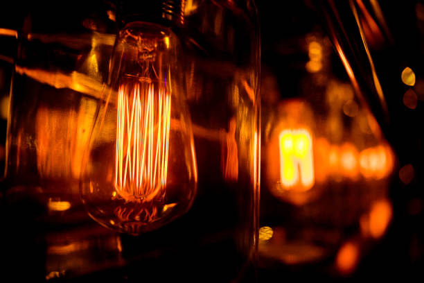 istock Beautiful retro luxury light bulb decor glowing for abstract background. Holiday or party background. 1139602520