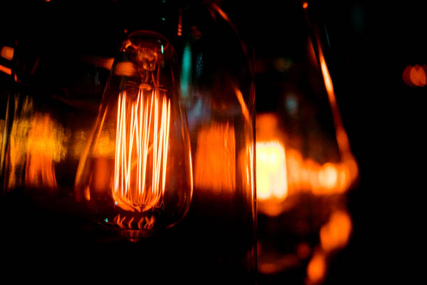 istock Beautiful retro luxury light bulb decor glowing for abstract background. Holiday or party background. 1139602549