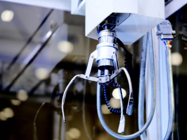 istock Cabinet catches the doll.A mechanical arm selecting 1139604881