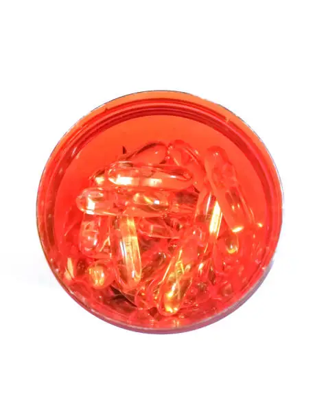 Fishoil capsule in Jar  on white background