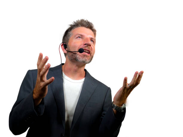 istock young attractive and confident successful man with headset speaking at corporate business coaching and training auditorium conference room talking giving motivation training isolated on white 1139607991