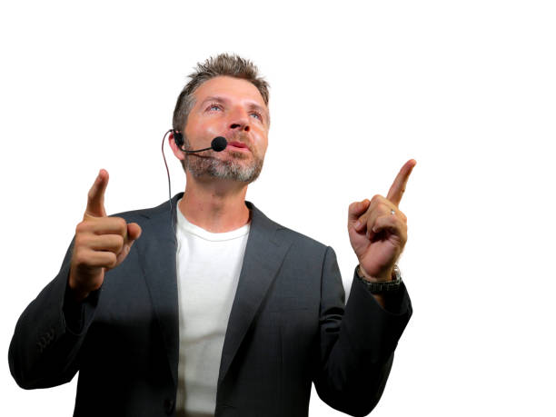 istock young attractive and confident successful man with headset speaking at corporate business coaching and training auditorium conference room talking giving motivation training isolated on white 1139608068
