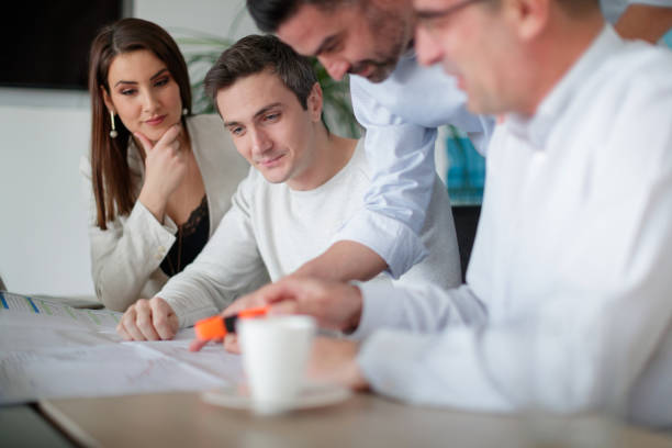 istock Coworkers satisfied by the data on the chart 1139608872