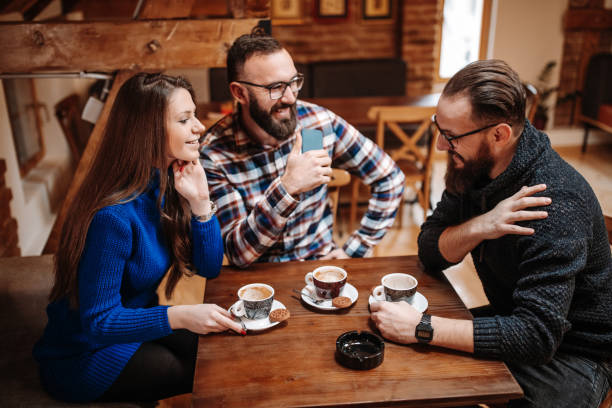 istock Cheerful friends at cafe 1139609105